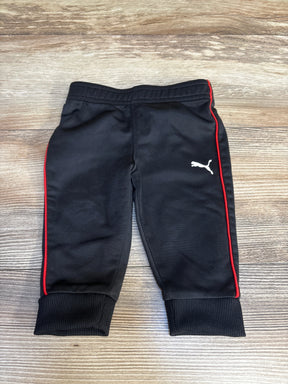 Black Puma baby joggers with red side stripes, ideal for kids' active wear