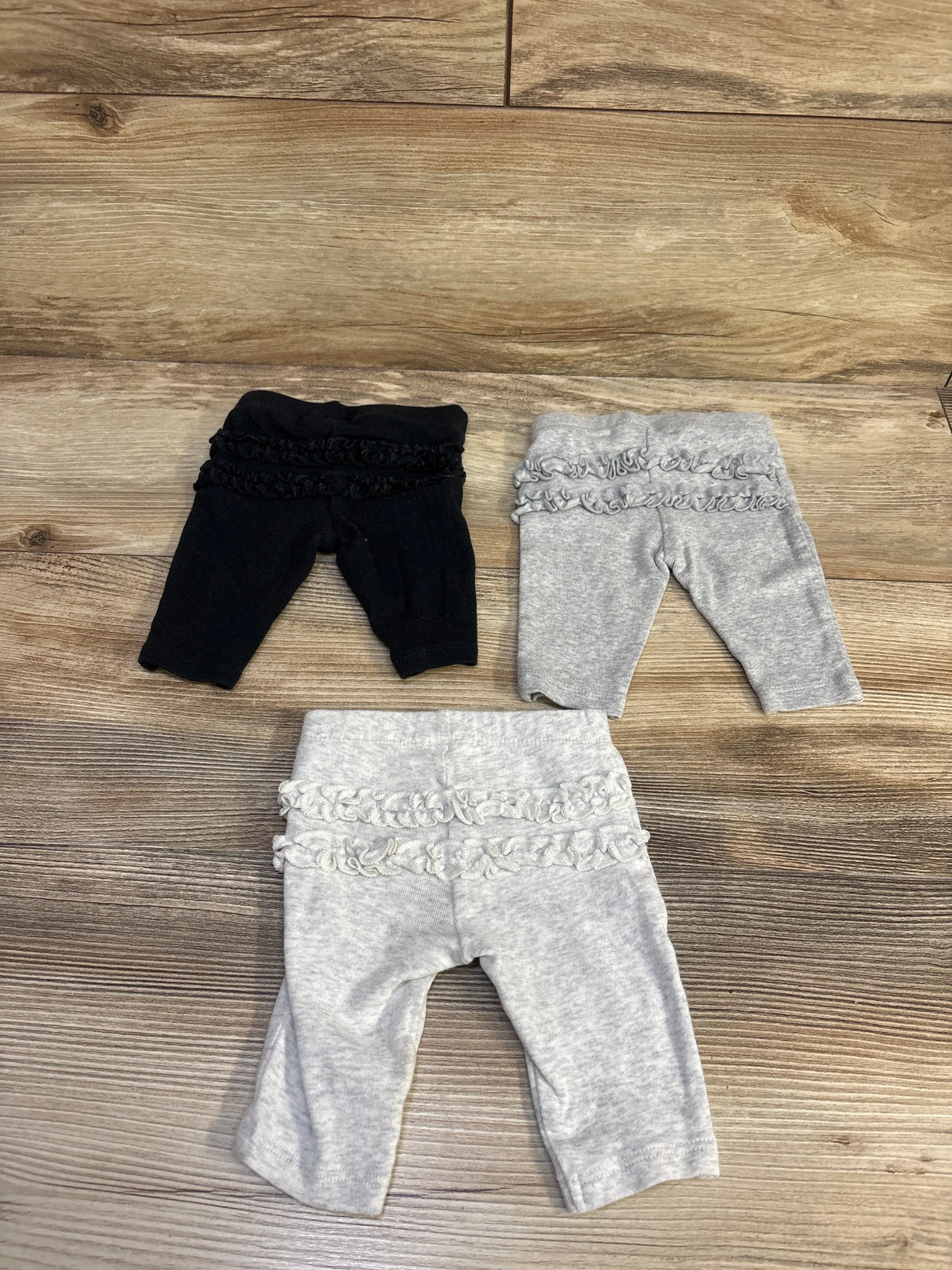 Carter's 3pk Ruffle Pants Black sz Newborn