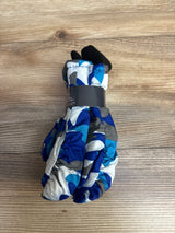 Folded kids winter gloves with blue, gray, and white camo pattern on wooden surface