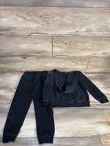 Flat lay of grey Rolling Stones sweatshirt and joggers size 4T showing hood and elastic cuffs on wood floor