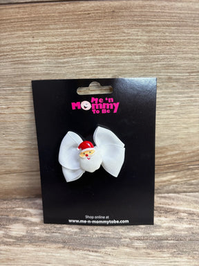 White ribbon bow with Santa Claus charm, kids holiday hair accessory on black card