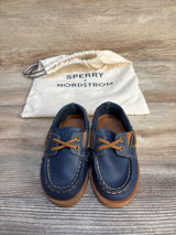 Navy blue Sperry toddler boat shoes with tan laces and Nordstrom drawstring bag