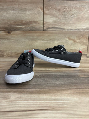 Angled front of Cat and Jack Lucian double zipper kids sneakers in grey with white sole, showing side zipper on wooden floor