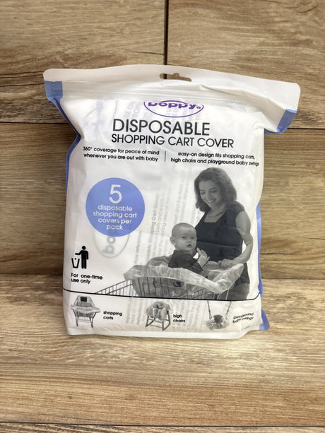 Front view of Boppy disposable shopping cart covers, five pack, for carts, high chairs, and playground baby swings
