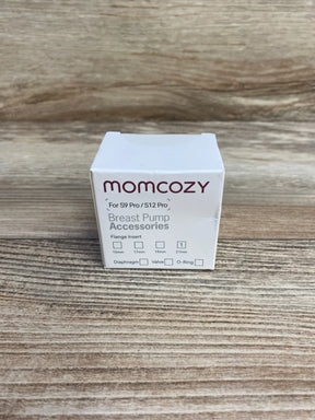 Front view of Momcozy breast pump accessories box for S9 Pro/S12 Pro showcasing brand name, 'Breast Pump Accessories' label and selected 21mm flange size with light wood background