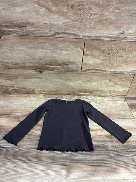 Front view of Zara Long Sleeve Ribbed Shirt in grey, size 18-24 months, with a small heart and scalloped hems on wood flooring