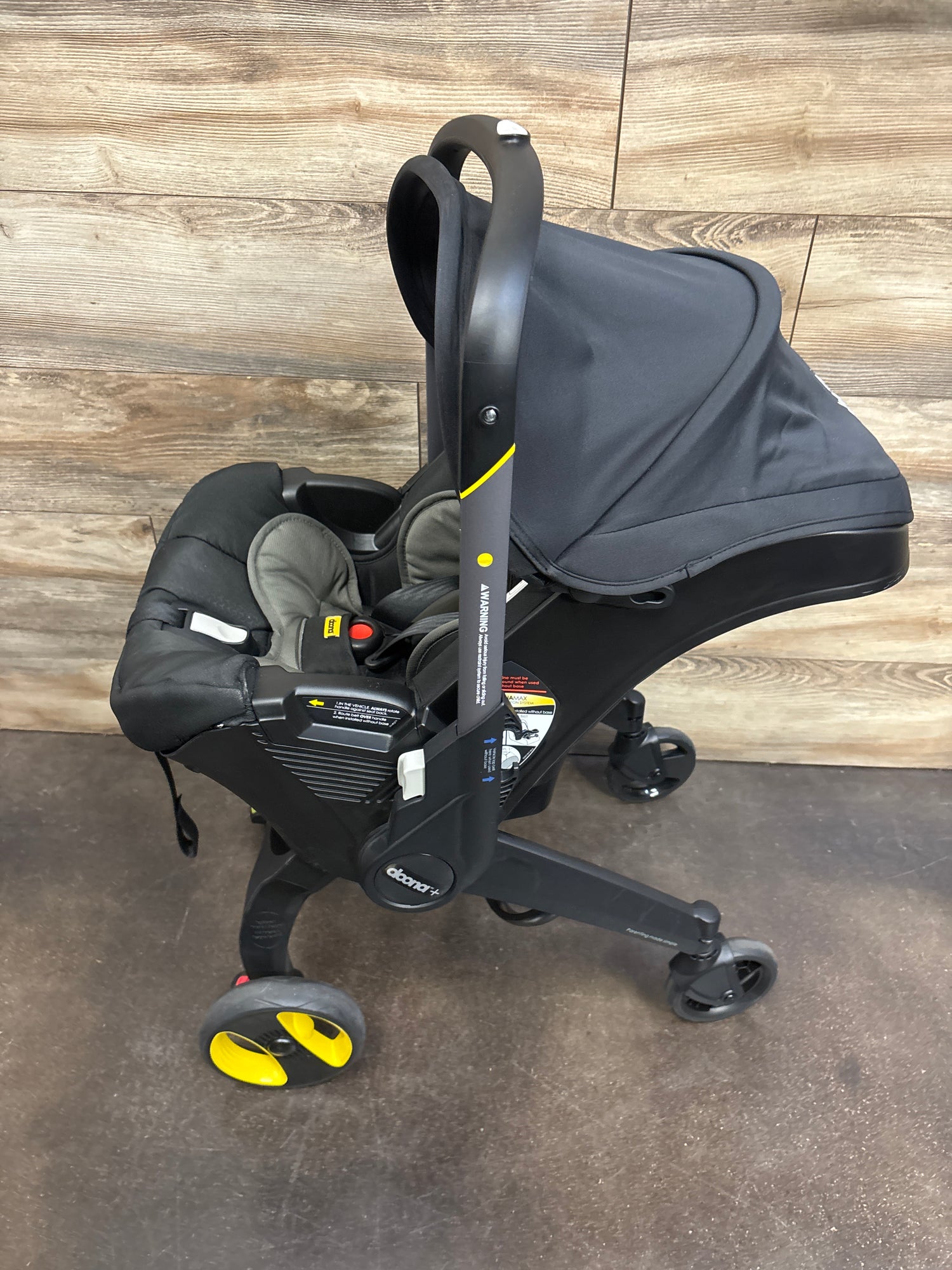 Doona Car Seat & Stroller All-in-One Travel System, Nitro Black