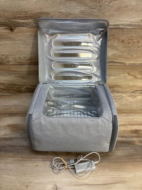 Gray insulated baby bottle warmer bag with USB charger, ideal for travel and on-the-go feeding
