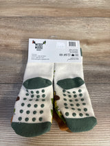 Messy Moose toddler grip socks with green dots, non-slip soles, perfect for baby and kids' safety on wood floors