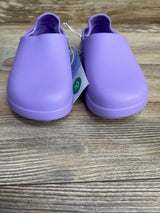 Front view of Cat and Jack purple toddler water shoes size 10C showing rounded toe and slip-on design on wood floor