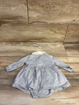 Front view of Carter’s grey polo bodysuit dress showcasing long sleeves, attached bloomers, and white collar on a wood-look floor