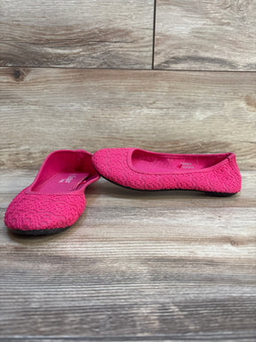 Girls’ bright pink lace ballet flats on wood floor, gently used kids shoes