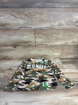 Flat lay of Old Navy boys camouflage waffle-knit long-sleeve shirt showing front OLD NAVY logo and visible 5T tag on wood floor