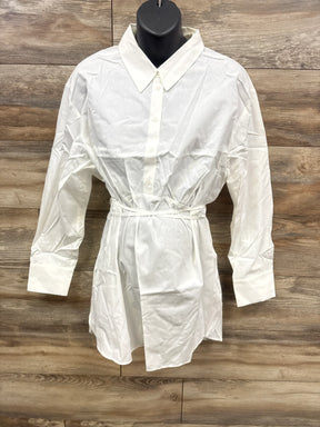 White long sleeve button-down shirt dress with waist tie on mannequin, wooden background
