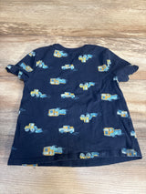 Navy blue kids t-shirt with yellow and blue construction truck print on wooden background