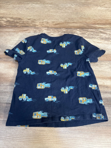 Navy blue kids t-shirt with yellow and blue construction truck print on wooden background
