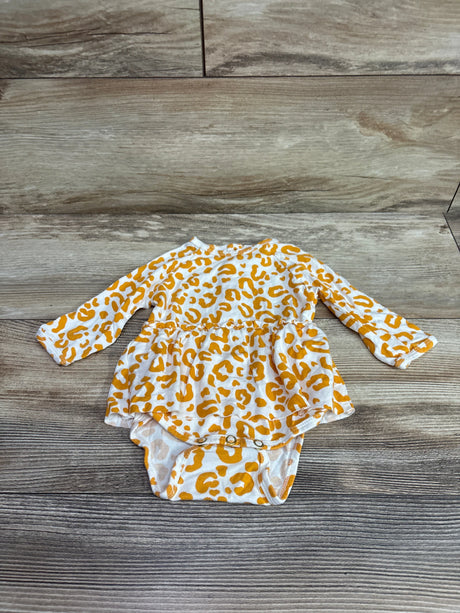 Top view of Larkspur bamboo leopard print bodysuit dress showcasing long sleeves and attached bottom on wood-look flooring