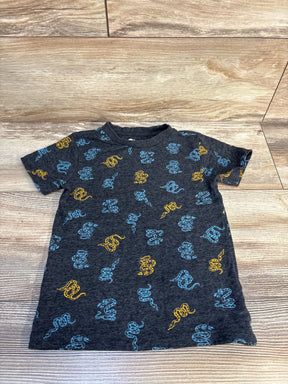Kids dark grey t-shirt with blue and yellow snake print, laid flat on wood background