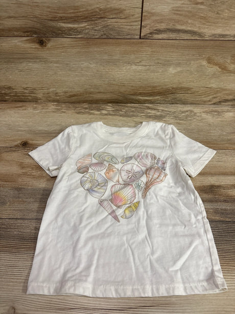 Ivory Cat & Jack children's t-shirt featuring a heart shape made of colorful seashells.