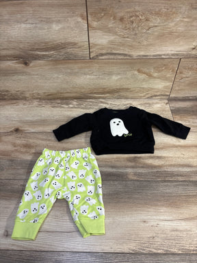 Baby Halloween outfit with ghost print: black long-sleeve top and lime green pants, perfect for kids' festive wear.
