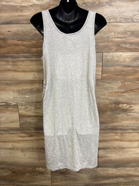 Front view of grey maternity ruched tank dress with side ruching and scoop neckline on black mannequin against wood backdrop