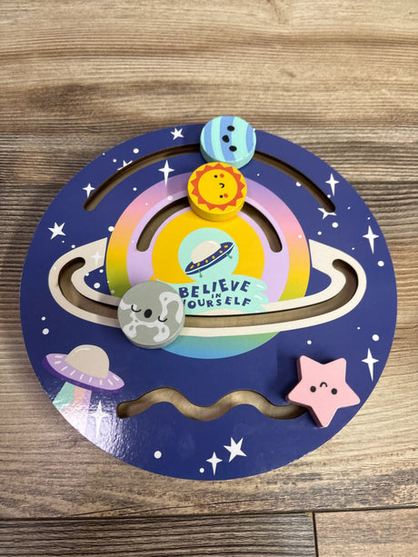 Top view of Bullseye’s Playground Wooden Sliding Maze Solar System showcasing planet pieces and Believe Yourself message