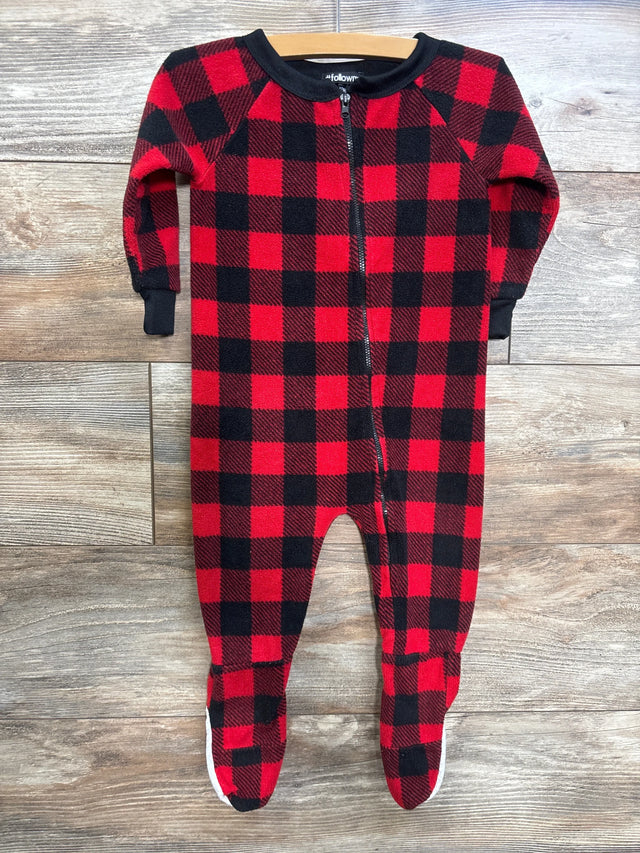 Flat lay of red and black buffalo plaid footed blanket sleeper, size 12 months, showing front zipper and black collar on wood floor
