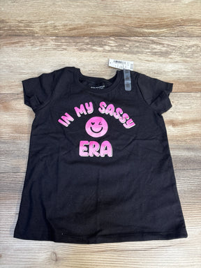 Black kids t-shirt with pink 'In My Sass Era' graphic and smiley face, size 4T, on wood floor