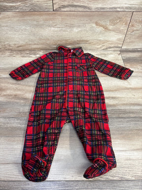 Red plaid infant footed sleeper with buttons on wooden floor, gently used baby clothing