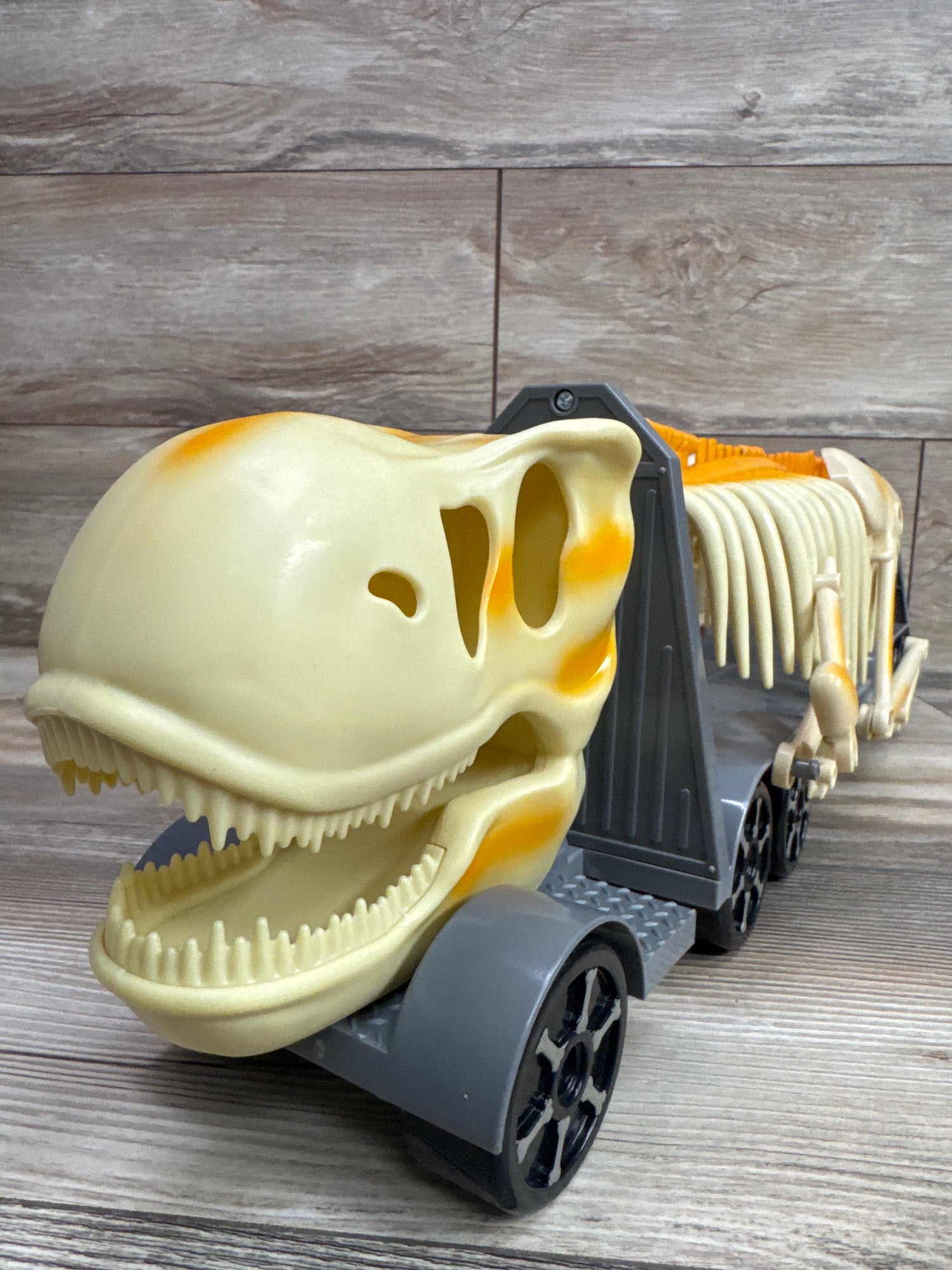 Kid Galaxy Skeleton Dinosaur Hauler Transporter Truck
