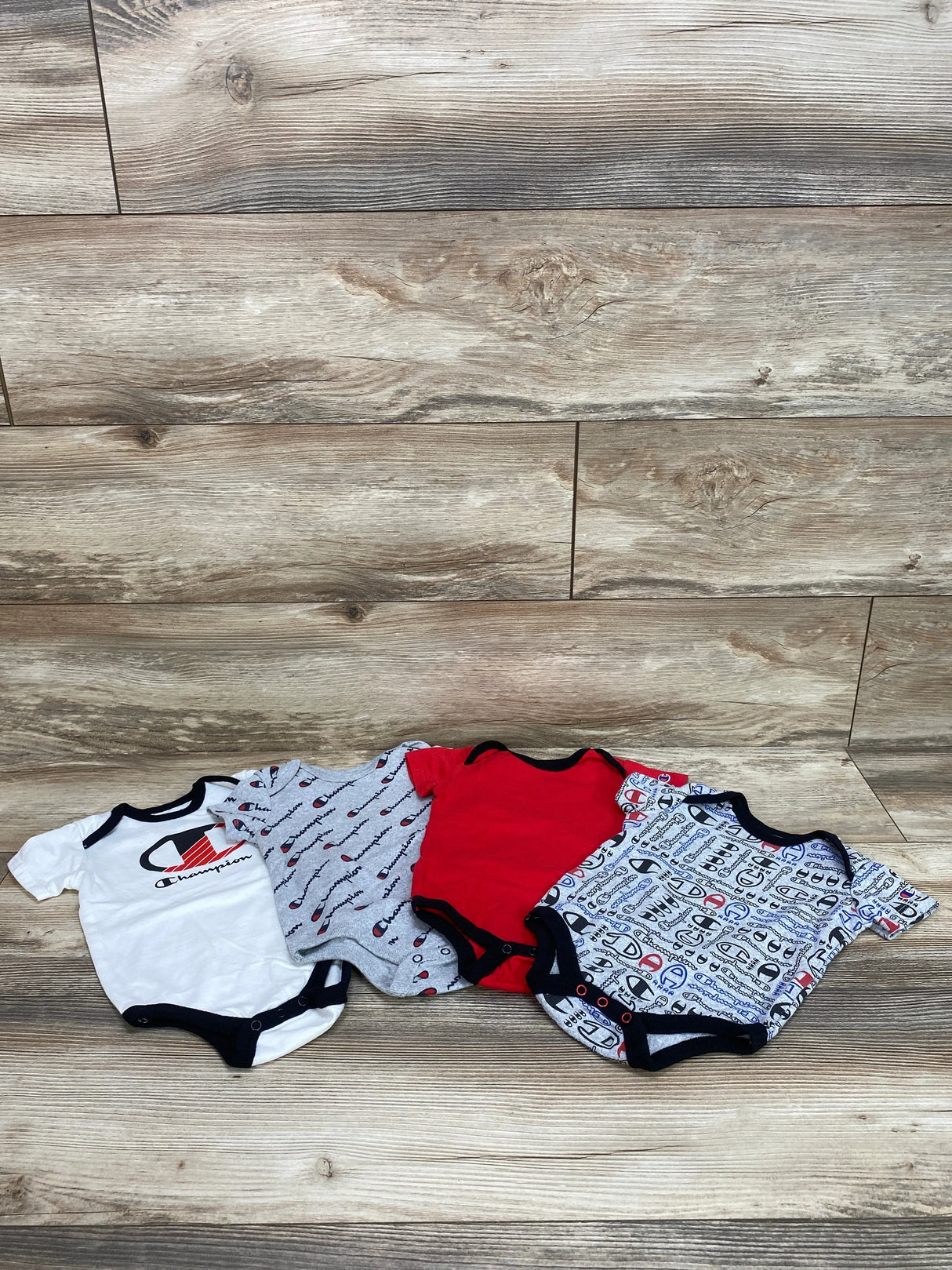 Champion 4pk Bodysuits Grey sz 3-6m