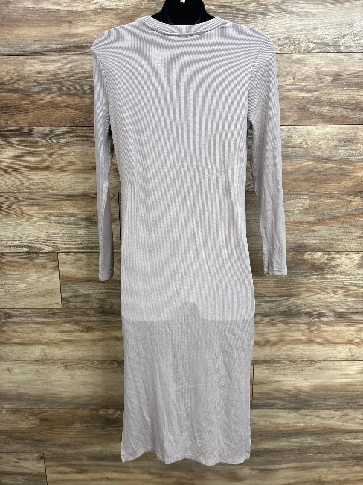 Back view of grey ribbed long-sleeve maternity dress size M on a mannequin against wood background