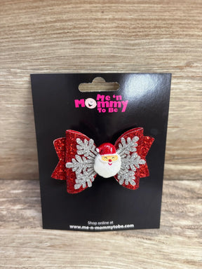Red glitter bow hair clip with Santa and snowflakes for kids, festive holiday accessory