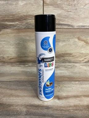 Front view of Sharkey's Swimmer's Clarifying Shampoo bottle showcasing Sharkey's Kids logo on a wood background