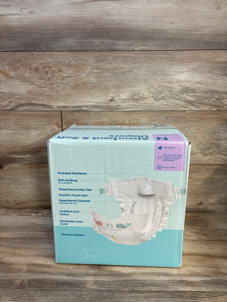 Hypoallergenic newborn diapers box with whale design, soft absorbent features for baby comfort