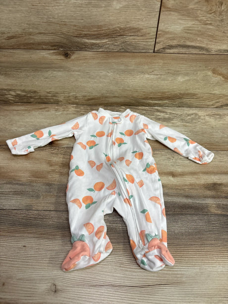 Front view of Just One You white 3-month sleeper showcasing citrus print, front zipper, and footed legs on a wood floor