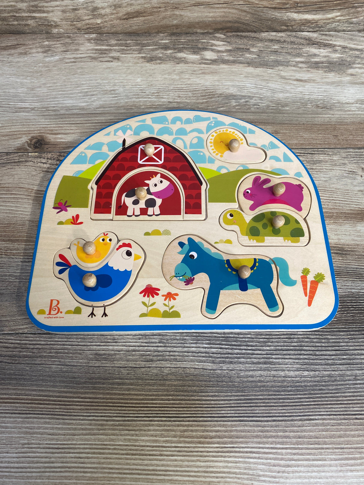 B. Toys Farm Animals Peg Puzzle