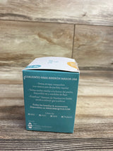 Mason jar baby bottle kit box with Spanish product details, BPA free and wooden background