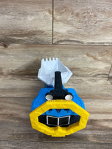 Blue and white toy dump truck with yellow steering wheel on wooden floor