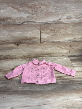 Pink toddler denim jacket with long sleeves and silver buttons on wooden floor