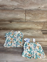 Bluey toddler short sleeve shirt and shorts set with cartoon dog print on wood background
