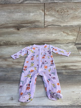 Front flat lay of Carter's purple ribbed footed snap sleeper showing orange and yellow floral print and front snap closure on wood floor