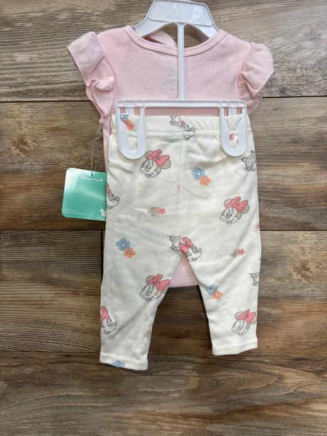 Front view of 3-piece newborn Minnie Mouse outfit: pink ruffle-sleeve bodysuit and cream Minnie-print leggings on hanger, size 0-3M