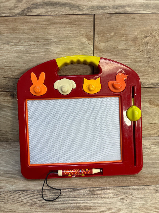 Front view of B. Toys LapTrec magnetic board with animal stamp knobs, stylus, and yellow erase slider on wood floor