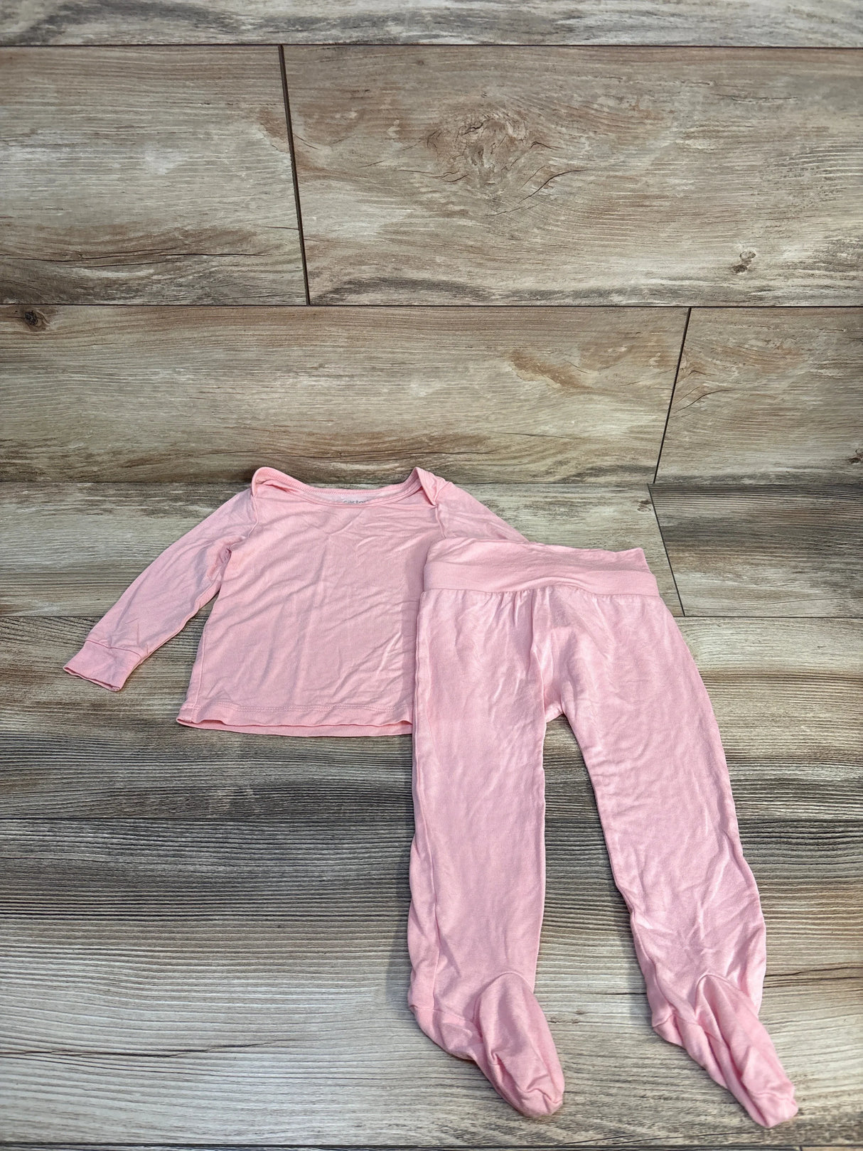 Pink baby footed pajama set with long sleeves, soft sleepwear for infants, cozy bedtime outfit