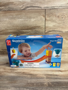 Hape Quadrilla Mega Skatepark marble run toy set in box with child playing, wood background