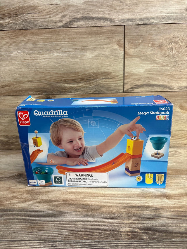 Hape Quadrilla Mega Skatepark marble run toy set in box with child playing, wood background