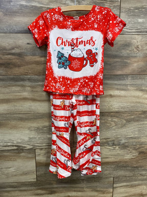 Festive red and white Christmas pajama set with gingerbread, tree, and hot cocoa design for kids