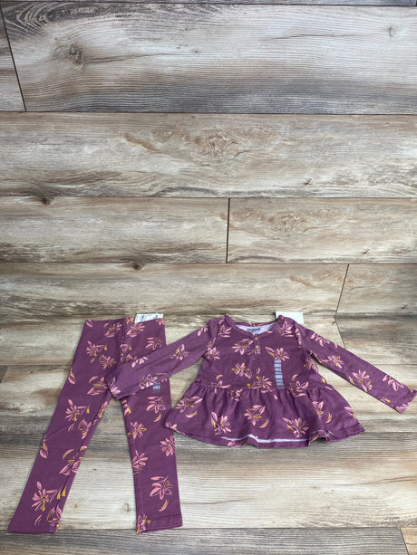 Purple floral pattern toddler girls long sleeve top and leggings set on wood floor