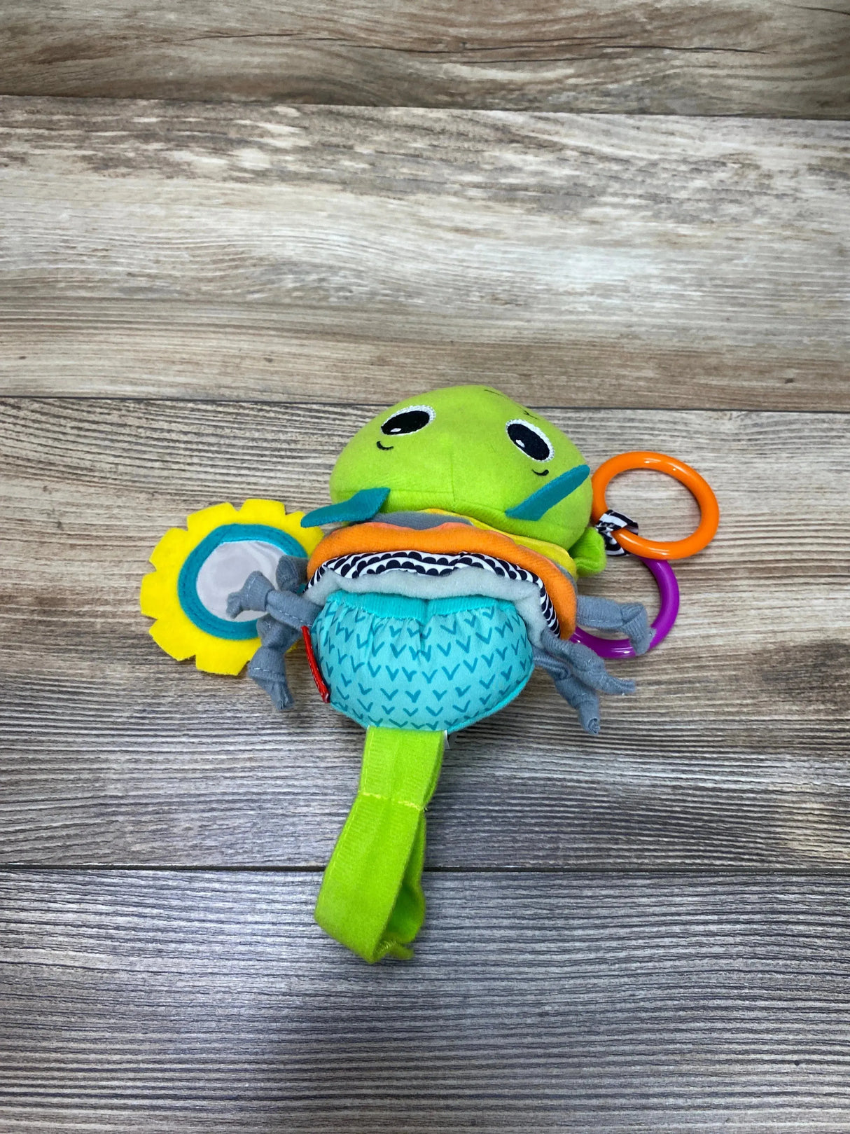 Infantino Hug and Tug Musical Bug Green